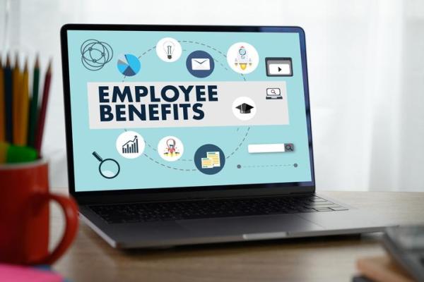Laptop with employee benefits webpage open