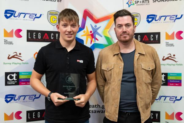 Harrison Taylor winner of sporting moment award with sponsor Legacy Sportswear