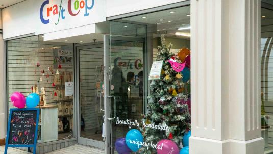 Exterior of Craft Coop Camberley with Christmas tree in window