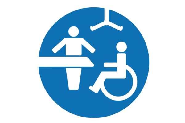 Blue circle with white icons of wheelchair hoist and table