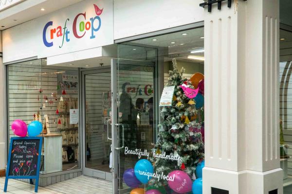 Exterior of Craft Coop Camberley with Christmas tree in window
