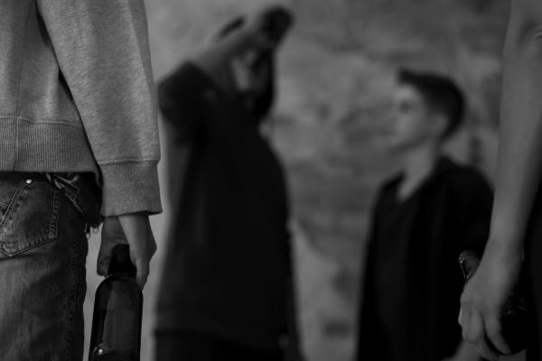 Black and white photo of teenage boys drinking