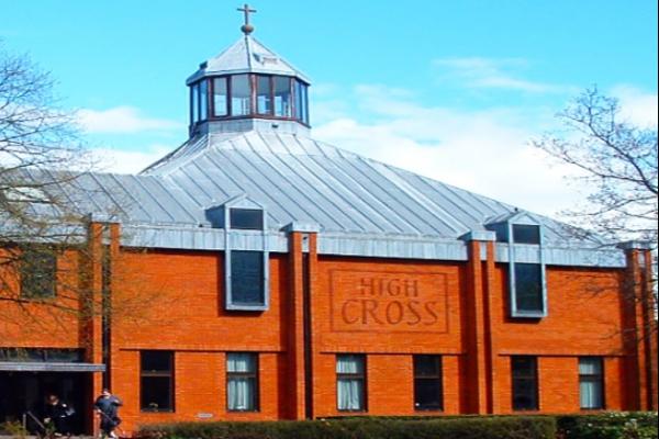 Red brick High Cross Church with lantern roof
