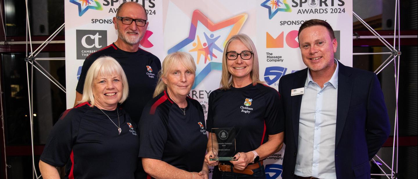 Lorraine Jackson and representatives from Chobham Rugby Club with award sponsor, Places Leisure