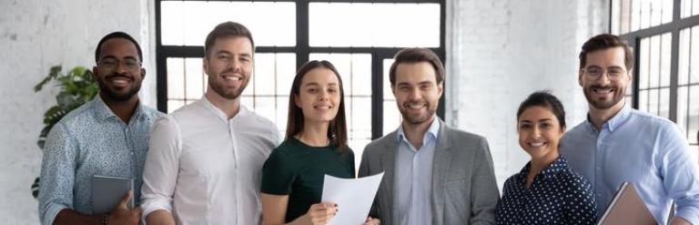 diverse group of young people in an office