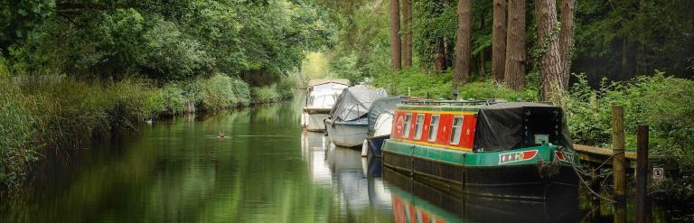 boats on the Basingstoke canal in Surrey Heath