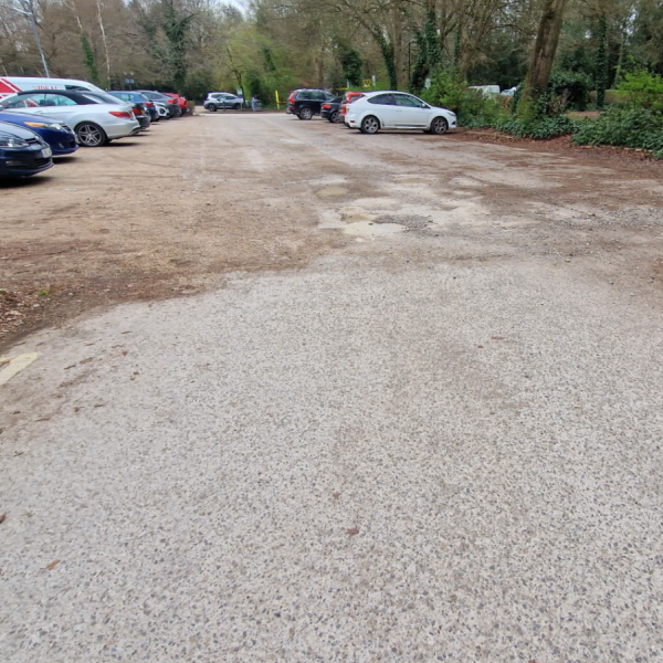 Car park view with cars parked in distance