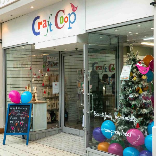 Exterior of Craft Coop Camberley with Christmas tree in window