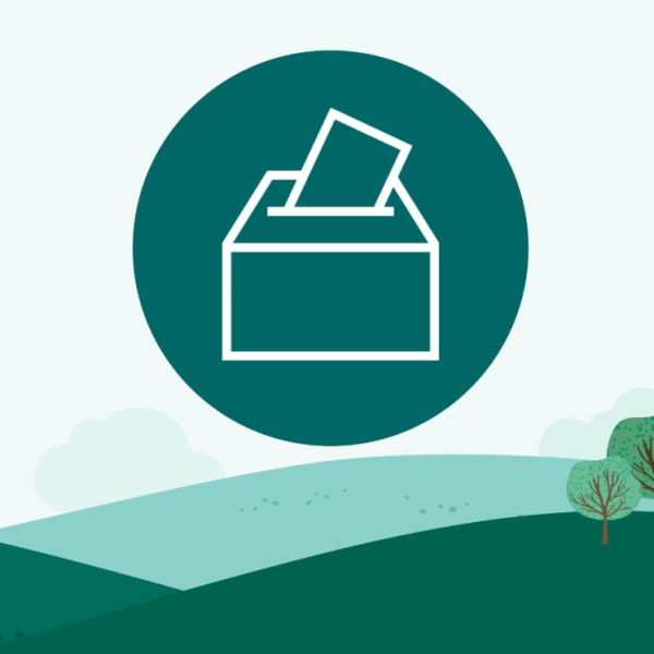 Ballot box graphic - dark green with light green background with hills and trees