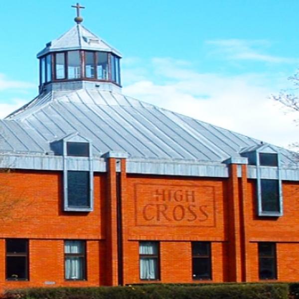 Red brick High Cross Church with lantern roof